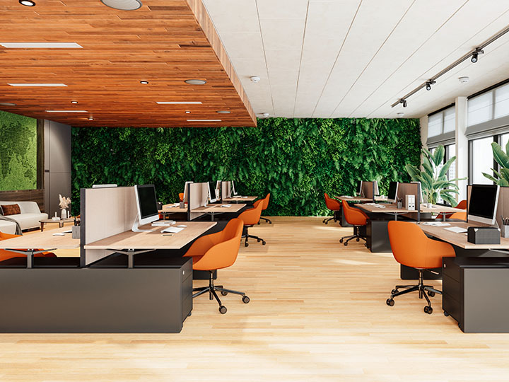 Empty Office Space with green plants near the windows and an entire back wall of green plant-life