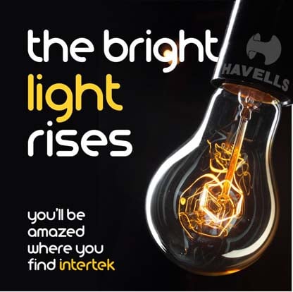 An old style incandescent filament light bulb with the 'Havells' brand name